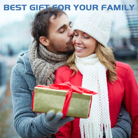 Couple in winter attire holding a gift box wrapped with a red ribbon, with 'Best Gift for Your Family' text above.