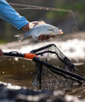 Angler using Foldable Lightweight Landing Net With Built In Length Scale And 61In Extendable Aluminum Handle Floating Design Dope Gear