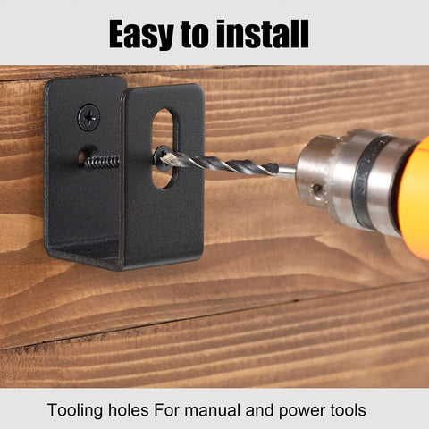 Heavy Duty U Shaped Door Barricade Bracket For 2x4 Openings being installed with a power drill on wood surface