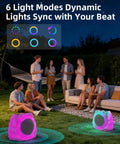 Rock Style Outdoor Bluetooth Speakers With Lights For Patio And Pool, colorful light modes in a backyard party setting