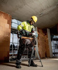 Pro Grade 18 Volt Cordless Angle Grinder With Brushless Motor And Quick Change Spindle for heavy duty metal cutting at a jobsite.