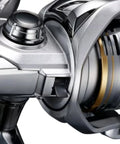 Close-up of Sedona C5000XG spinning reel with 24.3 lbs max drag and 13.3 lbs practical drag, showcasing metallic spool and frame design.