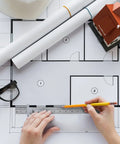 Person using Super Handy Flexible Stainless Steel Pocket Ruler Set With Detachable Clips on architectural blueprint