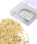 Gold-Plated Alloy Solder Chips 1x1mm, 0.5g Pack (About 200 Pieces) With 2% Gold in open box next to spilled chips