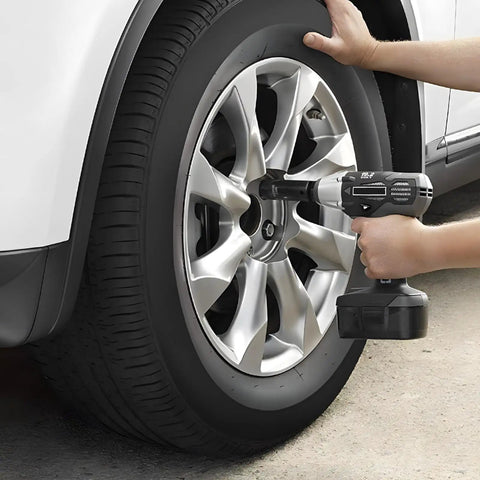 Impact Socket Set 3/8 Inch Drive, 48-Piece Including SAE 5/16 To 3/4 Inch And Metric 8 To 22 Mm being used on car wheel