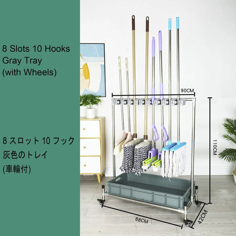 Front view of On The Go Stainless Steel Mop Holder And Cleaning Tool Organizer Cart With Drip Tray, in use with mops and brooms.
