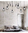 Straight Up Retro Industrial Chandelier With Working Pulley Cord Dope Black Metal Shade Swings Smooth Delivers That Killer Warm Glow Perfect For Your Living Room Or Kitchen Nook Setup Today in a bedroom with a bed and mirror.
