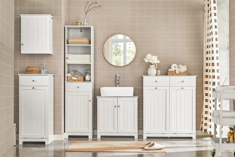 Bathroom with slim tilt-out laundry hamper cabinet for tight spaces, white finish, narrow pull-out storage unit, shelving and drawers.