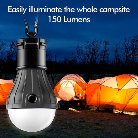 Palm Sized Portable LED Tent Light With Hanging Hook Emergency Lantern For Camping Hiking Backpacking Fishing And Power Outages Multicolor Glow 4 Pack Runs On 3 AAA Batteries Not Included hanging in front of illuminated tents at night.