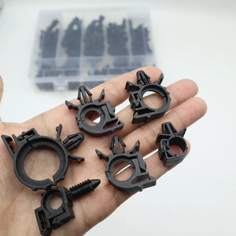 Close-up of Universal Wire Loom Clips Kit for Cars and Trucks, 60 Pieces Replacement Wiring Harness Clips shown in hand for size.