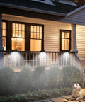 Small Solar Lights For Chain Link Fence With Motion Sensor Clip On Outdoor Lights For Garden Gate Deck Step Patio Camping Waterproof 2 Pack With 4 Light Modes illuminating a porch at night.