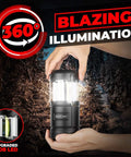 Person holding Portable LED Camping Lantern With Battery Power in black, showcasing 360° blazing illumination in a snowy forest.