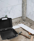 Badass Plastic Toolbox Portable Tool Case With Detachable Storage Tray And Super Grippy Handle on a construction site.
