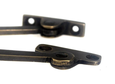 Close-up view of Heavy Gauge Solid Brass Lid Stays Kickstand Set With Rich Bronzed Finish for wooden boxes.