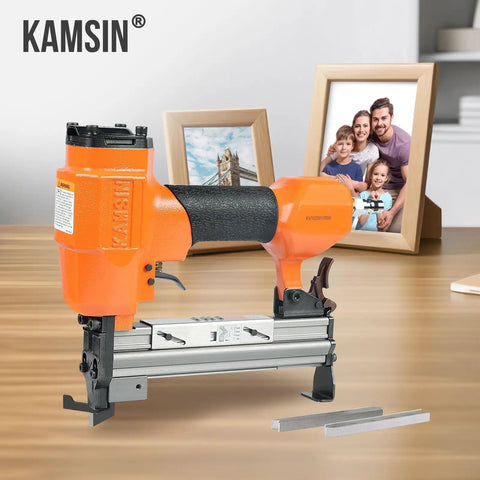 Pneumatic Picture Frame V Nailer For 5/16 To 19/32 Inch V Nails, 30 Gauge Air Powered Frame Joiner on a desk with frames