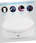 Romisbaba Electric Rotating Jewelry Display Stand For Bracelets Watches With Motorized Turntable and Cool LED Lighting showing multiple power supply options.