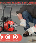 Heavy Duty 100Ft Electric Drain Auger With 750W Auto Feed Steel Core Cable in use for pipe cleaning.