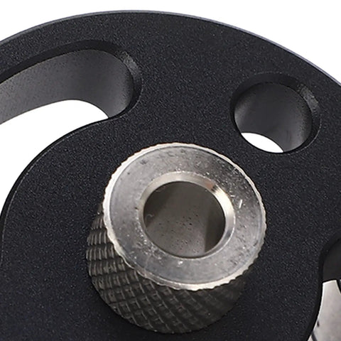 Close-up of Pro Grade Self Centering Doweling Jig With Eight Precision Drill Bushings showing the precision drill bushing detail.