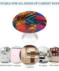 Dope Stainless Steel Cabinet Knobs Featuring A Knockout Multicolor Quilt Design With Hella Smooth Pulling Action and Hefty Durability for Real Deal Kitchen or Furniture Upgrades on a round knob.