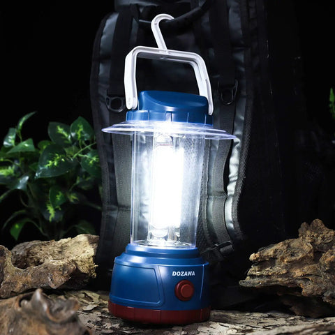 Beast Bright 3000 Lumen LED Camping Lantern With 5 Modes IP44 Waterproof 6400mAh Power Bank USB Rechargeable beside a backpack
