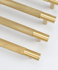 Four Pack 3 Inch Solid Brass Cabinet Pulls In Brushed Gold Finish, close-up view showing texture and details of heavy duty drawer handles.