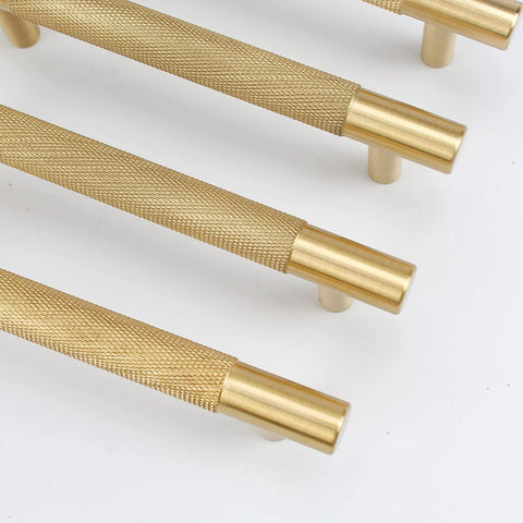 Four Pack 3 Inch Solid Brass Cabinet Pulls In Brushed Gold Finish, close-up view showing texture and details of heavy duty drawer handles.
