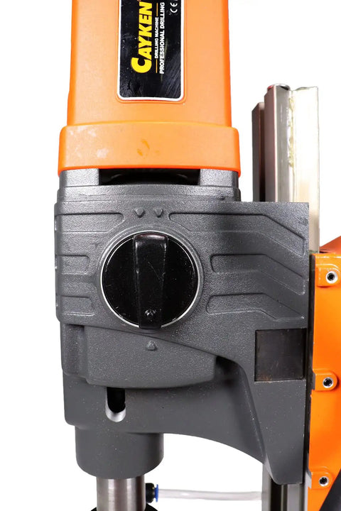 Close-up of Badass Magnetic Drill Press With 1.8 Inch Boring Cap And 1700 Watt Variable Speed Motor controls and housing.