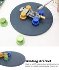 Magnetic PCB Soldering Holder And Welding Bracket Set showing circuit board secured with colored magnets on metal plate