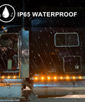 Truck with IP65 waterproof 2.5 Inch Round Red LED Marker Lights With 13 LEDs And Multi Faceted Reflectors, glowing in rain