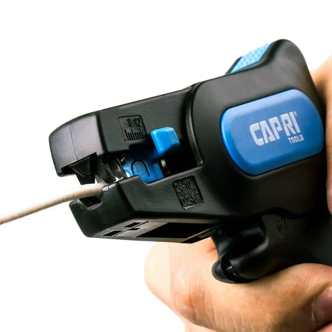 Close-up of Automatic Wire Stripper And Cutter With Narrow Profile For Tight Spaces, Self Adjusting Blades For 24-10 AWG, held in hand
