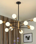 Sputnik Style 10 Light Chandelier Over Dining Table In Black And Gold Dope Mid Century Vibe Pendant Lighting