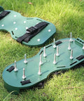 Adjustable Lawn Aerator Shoes With 13 Heavy Nails for Quick Lawn Aeration on grass, showing green plastic sole and straps