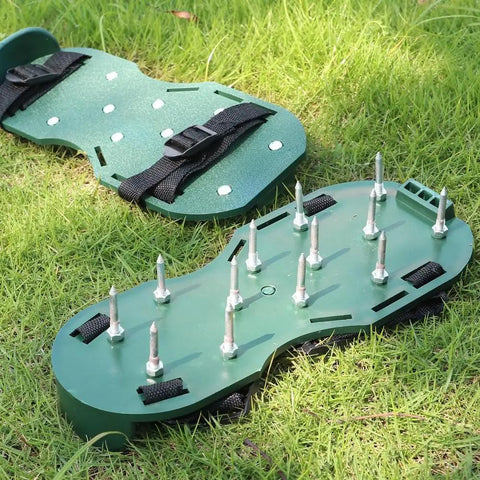 Adjustable Lawn Aerator Shoes With 13 Heavy Nails for Quick Lawn Aeration on grass, showing green plastic sole and straps