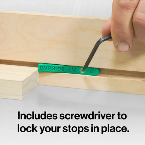 Close-up of MicroJig MatchFit Pop Stop 6-Pack with custom screwdriver inserting track stop into dovetail groove.