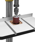 Rock Solid Heavy Duty Drill Press Table With Hella Stable Vibration Damping Platform Built Tough For Woodworking And Metalworking Featuring Ultra Dense Base And Smooth Operator Work Surface with sanding drum in use.