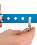 Hands using Spoke Bearing And Cotter Gauge For Bicycles, Handy Wheel Maintenance Tool to measure cotter pin size with blue scale.