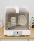 Skip The Sink Scrubbing With This Portable Countertop Dishwasher Boasting Three Cycle Options No Hookup Hassles Four Place Setting Capacity Ideal For Apartments Rvs And Studios Plus Self Clean Air Dry And Gentle Baby Cycles with dishes inside.