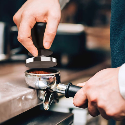 Using 53mm Espresso Calibrated Tamper With Spring Loaded Handle on a portafilter for consistent espresso tamping