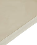 Close-up of tan heavy-duty outdoor chair cover seam, part of the Heavy-Duty Outdoor Chair Covers Four-Piece Set Waterproof Tan For Patio And Backyard All-Weather Protection Against Sun Rain Snow Dirt Sap And More To Keep Your Outdoor Furniture Looking Fresh And New.