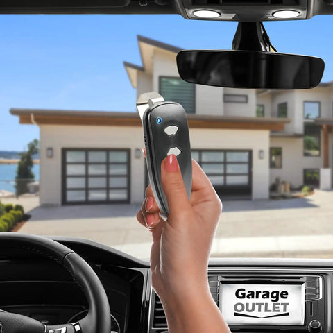 Hand holding Two Pack 2-Button Garage Door Opener Remote for M3-2312 outside modern garage, Compatible with Marantec Keypad