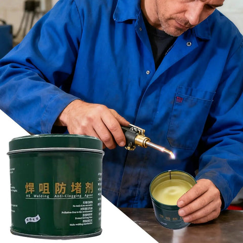 Person using torch on Nozzle Cleaner Gel 200g for Welding Spatter and Flux Removal container in workshop.