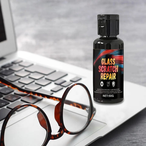 Fast Acting Eyeglass Scratch Remover 50g bottle with glasses on laptop surface