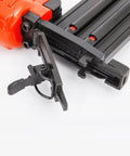 Real Deal Air Brad Nailer With Quick Release Bottom Load Magazine And 1000 18G Type 180 Brads To Knock Out Woodworking Projects In Bold Orange Carry Case close-up of quick release mechanism.