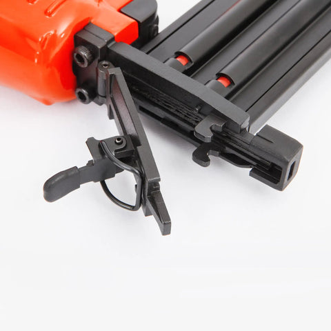 Real Deal Air Brad Nailer With Quick Release Bottom Load Magazine And 1000 18G Type 180 Brads To Knock Out Woodworking Projects In Bold Orange Carry Case close-up of quick release mechanism.