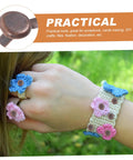 Hand wearing crochet accessories secured with 50 Pack Miniature Metal Fasteners and Close Pins for Scrapbooking Card Making and Craft DIY Brads Paper Fasteners for Arts and Crafts Projects and Creative Kid Friendly Activities Easy to Use.