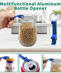 Blue metal mason jar sealer attachment with accessory hose beside a glass mason jar filled with beans (front view)