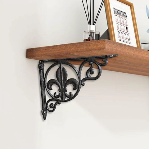 Heavy Duty Decorative Shelf Bracket For Wall Mounts supporting a wooden shelf, black iron, fleur-de-lis design, easy install