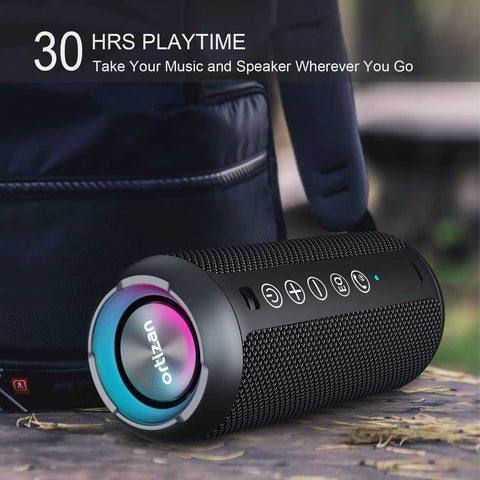 Rugged Portable Bluetooth Speaker With 24W Stereo Sound Deep Bass TWS Pairing IPX7 Waterproof on outdoor table