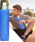 Ultra Lightweight Foldable Water Bottle For Hiking And Outdoor Adventures with man sitting and holding blue pouch