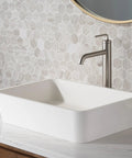 Ramus One Handle Vessel Sink Bathroom Faucet With Pop Up Drain Dope Matte Black Finish next to a white rectangular vessel sink